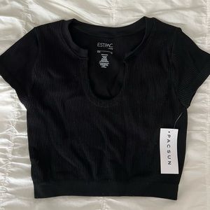 Pacsun womens top, size XS but super stretchy nylon and spandex material.